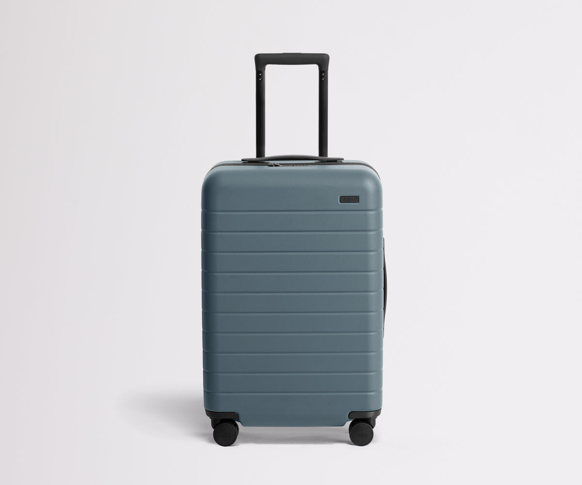 The Bigger Carry-On in Coast Blue by Away — brand photography